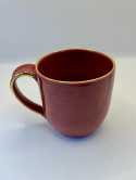 Różowy kubek ceramiczny, złocony na krawędziach ok 350 ml.