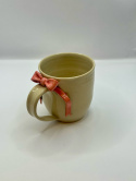 Uroczy kubek ceramiczny z koralową kokardką ok 300ml