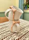 Uroczy kubek ceramiczny z jasnoróżową kokardką ok 300ml